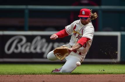 Jun 11, 2022; St. Louis, Missouri, USA;  St. Louis Cardinals second baseman Brendan Donovan (33) dives for a ball against the Cincinnati Reds during the second inning at Busch Stadium. Mandatory Credit: Jeff Curry-USA TODAY Sports