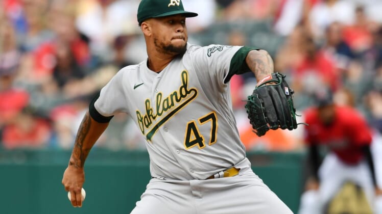 Jun 11, 2022; Cleveland, Ohio, USA; Oakland Athletics starting pitcher Frankie Montas (47) throws a pitch  during the first inning against the Cleveland Guardians at Progressive Field. Mandatory Credit: Ken Blaze-USA TODAY Sports