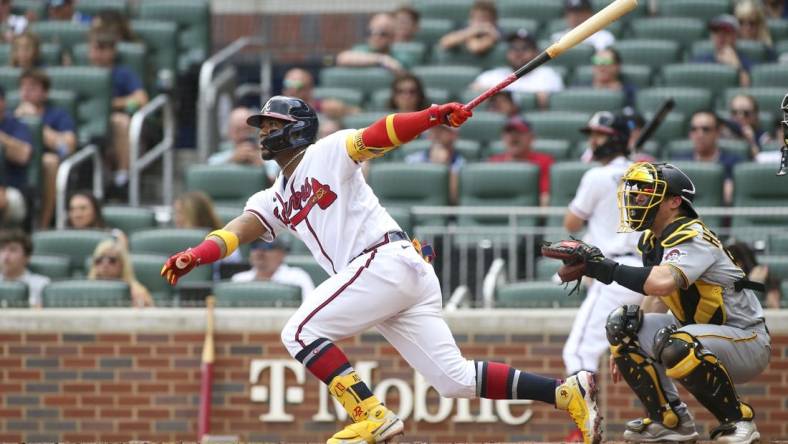 Jun 11, 2022; Atlanta, Georgia, USA; Atlanta Braves right fielder Ronald Acuna Jr. (13) hits a home run against the Pittsburgh Pirates in the first inning at Truist Park. Mandatory Credit: Brett Davis-USA TODAY Sports