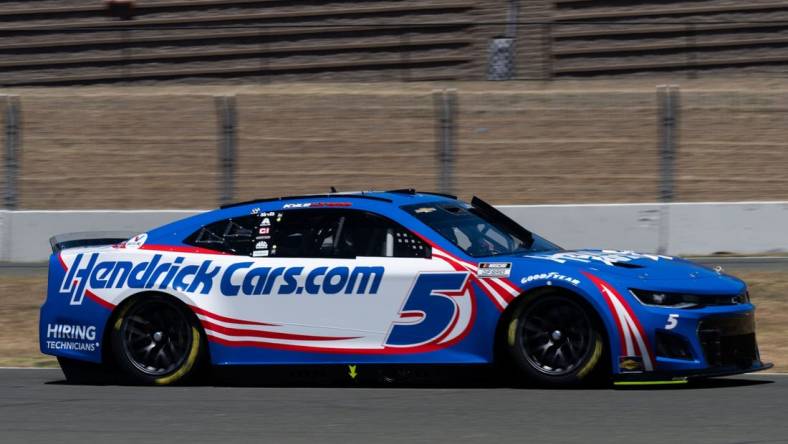 Jun 11, 2022; Sonoma, California, USA;  NASCAR Cup Series driver Kyle Larson (5) practices a day before the race before the start of the NASCAR Truck Series DoorDash 250 at Sonoma Raceway. Mandatory Credit: Stan Szeto-USA TODAY Sports