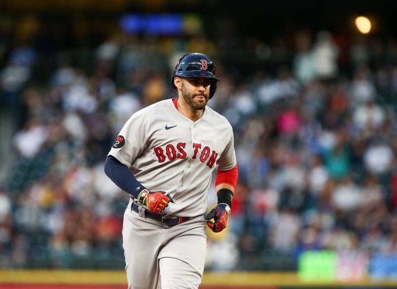Jun 11, 2022; Seattle, Washington, USA;  Boston Red Sox designated hitter J.D. Martinez (28) runs the bases after hitting a two run home run against the Seattle Mariners during the fifth inning at T-Mobile Park. Mandatory Credit: Lindsey Wasson-USA TODAY Sports