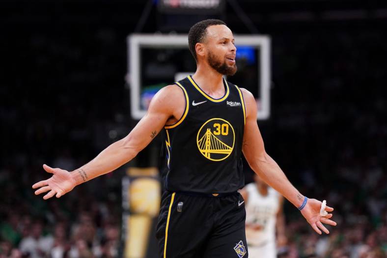 Jun 10, 2022; Boston, Massachusetts, USA; Golden State Warriors guard Stephen Curry (30)  reacts after non-call during the third quarter of game four  against the Boston Celtics in the 2022 NBA Finals at the TD Garden. Mandatory Credit: David Butler II-USA TODAY Sports