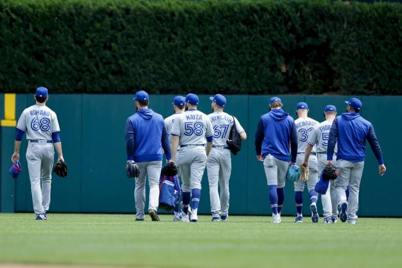 Jun 12, 2022; Detroit, Michigan, USA;  Toronto Blue Jays pitchers walk to the bullpen before the first inning against the Detroit Tigers at Comerica Park. Mandatory Credit: Rick Osentoski-USA TODAY Sports