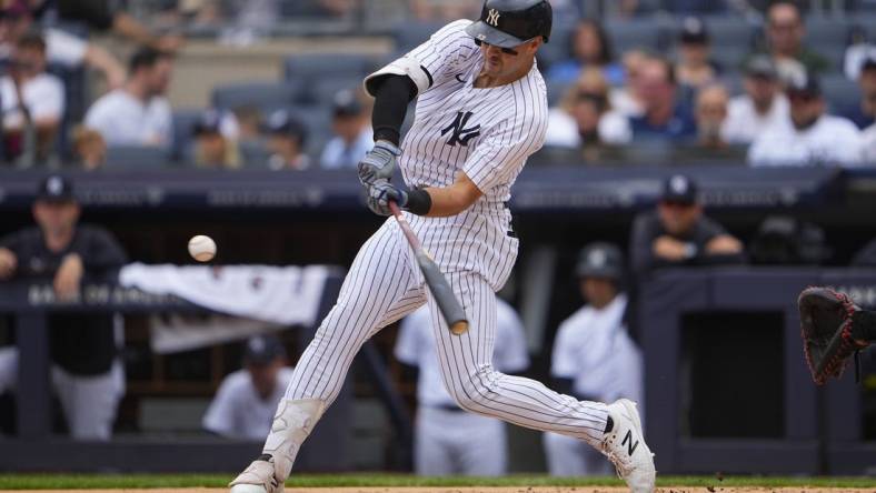 Jun 12, 2022; Bronx, New York, USA; New York Yankees right fielder Joey Gallo (13) hits an RBI double against the Chicago Cubs during the first inning at Yankee Stadium. Mandatory Credit: Gregory Fisher-USA TODAY Sports