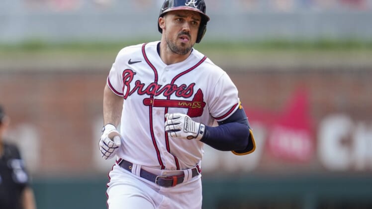 Jun 12, 2022; Cumberland, Georgia, USA; Atlanta Braves left fielder Adam Duvall (14) runs the bases after hitting a home run against the Pittsburgh Pirates during the second inning at Truist Park. Mandatory Credit: Dale Zanine-USA TODAY Sports