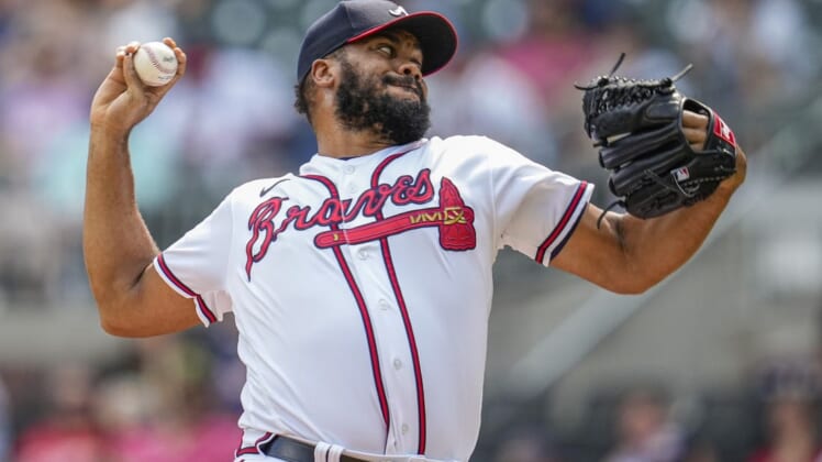 Jun 12, 2022; Cumberland, Georgia, USA; Atlanta Braves relief pitcher Kenley Jansen (74) pitches against the Pittsburgh Pirates during the ninth inning at Truist Park. Mandatory Credit: Dale Zanine-USA TODAY Sports