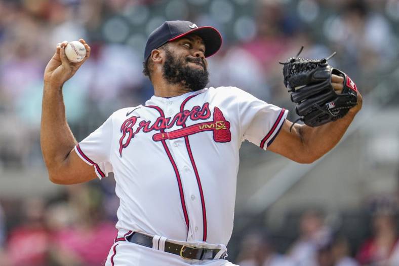 Jun 12, 2022; Cumberland, Georgia, USA; Atlanta Braves relief pitcher Kenley Jansen (74) pitches against the Pittsburgh Pirates during the ninth inning at Truist Park. Mandatory Credit: Dale Zanine-USA TODAY Sports