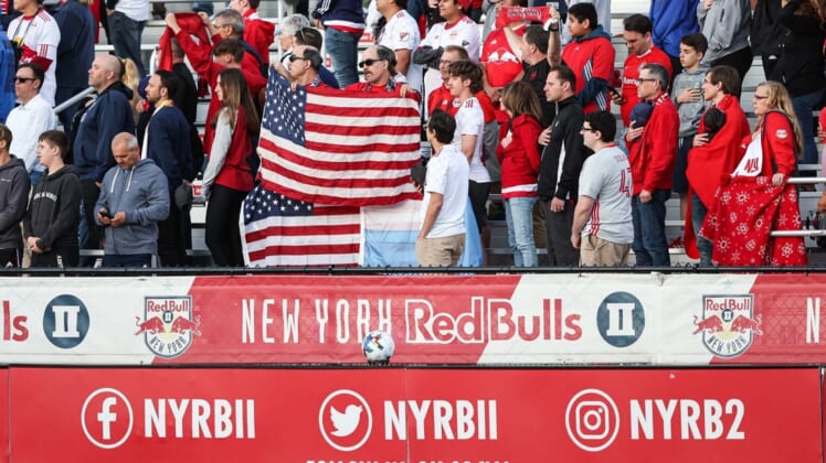 May 25, 2022; Montclair, New Jersey, USA; Fan stand for the national anthem before the game between the New York Red Bulls and Charlotte FC at Montclair State University Soccer Park. Mandatory Credit: Vincent Carchietta-USA TODAY Sports