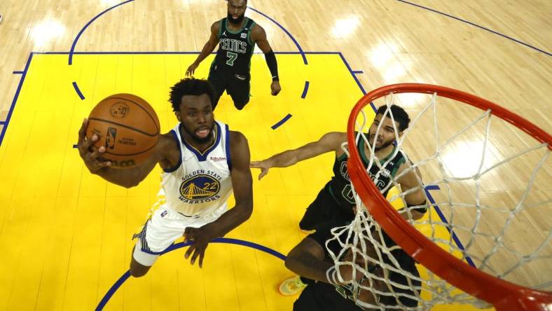 Jun 13, 2022; San Francisco, California, USA; Golden State Warriors forward Andrew Wiggins (22) goes to the basket in game five of the 2022 NBA Finals against the Boston Celtics at Chase Center. Mandatory Credit: Jed Jacobsohn/Pool Photo-USA TODAY Sports