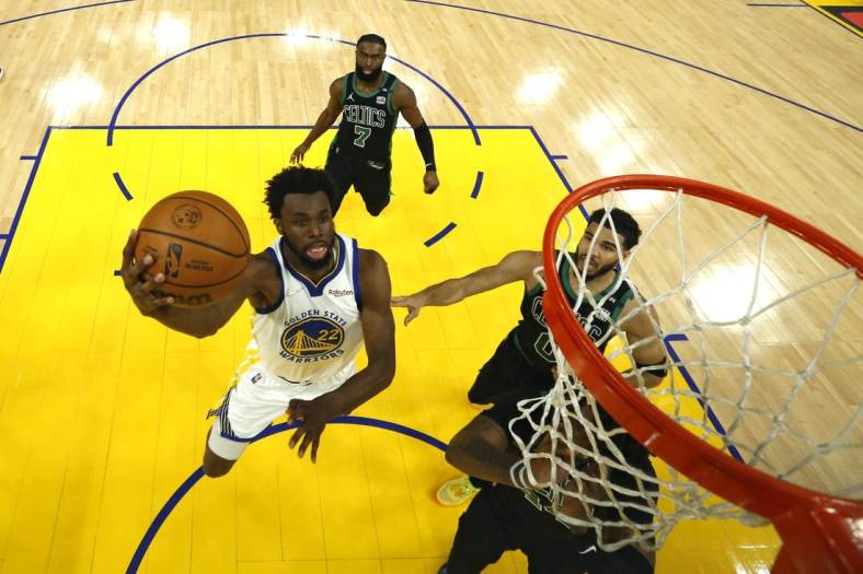 Jun 13, 2022; San Francisco, California, USA; Golden State Warriors forward Andrew Wiggins (22) goes to the basket in game five of the 2022 NBA Finals against the Boston Celtics at Chase Center. Mandatory Credit: Jed Jacobsohn/Pool Photo-USA TODAY Sports