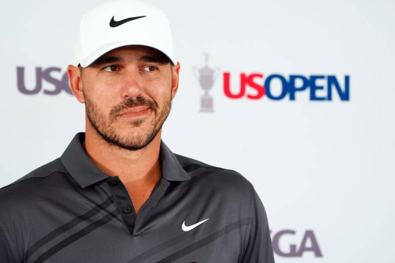 Jun 14, 2022; Brookline, Massachusetts, USA; Brooks Koepka addresses the media during a press conference for the U.S. Open golf tournament at The Country Club. Mandatory Credit: John David Mercer-USA TODAY Sports