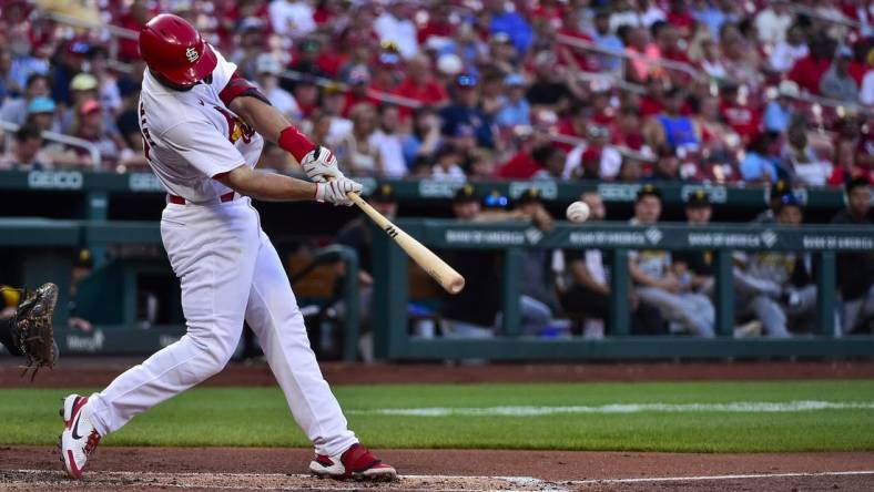 Jun 14, 2022; St. Louis, Missouri, USA;  St. Louis Cardinals first baseman Paul Goldschmidt (46) hits a three run home run for his second home run of the game against the Pittsburgh Pirates during the second inning at Busch Stadium. Mandatory Credit: Jeff Curry-USA TODAY Sports