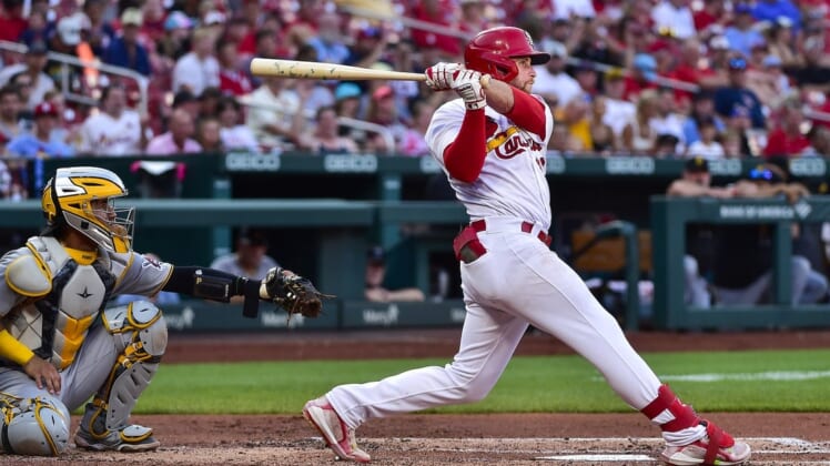 Jun 14, 2022; St. Louis, Missouri, USA;  St. Louis Cardinals third baseman Brendan Donovan (33) hits a one run single against the Pittsburgh Pirates during the second inning at Busch Stadium. Mandatory Credit: Jeff Curry-USA TODAY Sports
