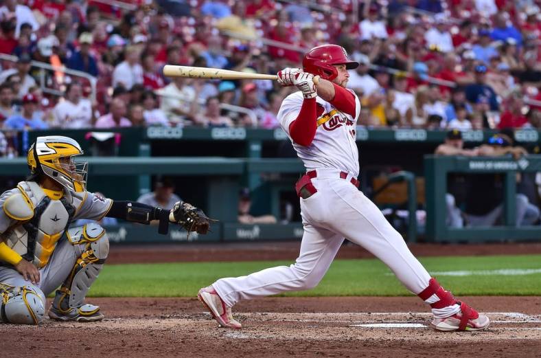 Jun 14, 2022; St. Louis, Missouri, USA;  St. Louis Cardinals third baseman Brendan Donovan (33) hits a one run single against the Pittsburgh Pirates during the second inning at Busch Stadium. Mandatory Credit: Jeff Curry-USA TODAY Sports