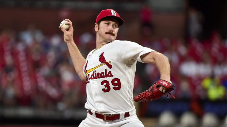 Jun 14, 2022; St. Louis, Missouri, USA;  St. Louis Cardinals starting pitcher Miles Mikolas (39) pitches against the Pittsburgh Pirates during the sixth inning at Busch Stadium. Mandatory Credit: Jeff Curry-USA TODAY Sports