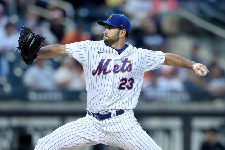 Jun 15, 2022; New York City, New York, USA; New York Mets starting pitcher David Peterson (23) pitches against the Milwaukee Brewers during the third inning at Citi Field. Mandatory Credit: Brad Penner-USA TODAY Sports