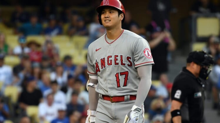 Jun 15, 2022; Los Angeles, California, USA; Los Angeles Angels player Shohei Ohtani (17) reacts after striking out against the Los Angeles Dodgers in the first inning at Dodger Stadium. Mandatory Credit: Richard Mackson-USA TODAY Sports