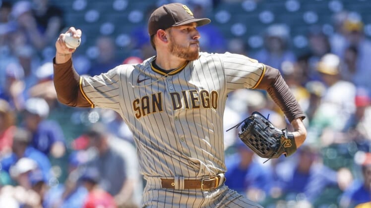 Jun 16, 2022; Chicago, Illinois, USA; San Diego Padres starting pitcher Joe Musgrove (44) delivers against the Chicago Cubs during the first inning at Wrigley Field. Mandatory Credit: Kamil Krzaczynski-USA TODAY Sports