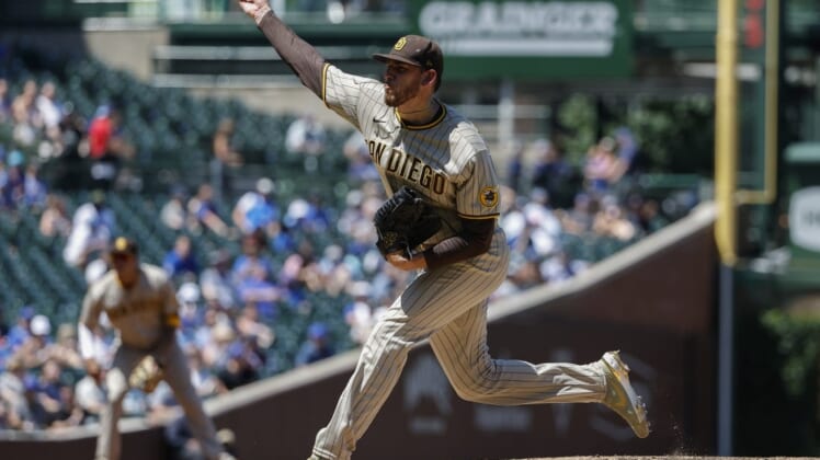 Jun 16, 2022; Chicago, Illinois, USA; San Diego Padres starting pitcher Joe Musgrove (44) delivers against the Chicago Cubs during the second inning at Wrigley Field. Mandatory Credit: Kamil Krzaczynski-USA TODAY Sports