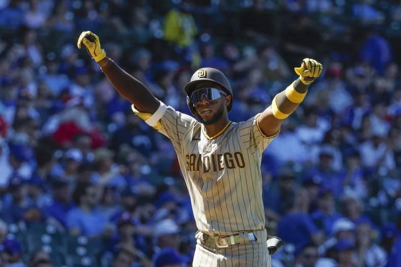 Jun 16, 2022; Chicago, Illinois, USA; San Diego Padres left fielder Jurickson Profar (10) rounds the bases after hitting a solo home run against the Chicago Cubs during the eighth inning at Wrigley Field. Mandatory Credit: Kamil Krzaczynski-USA TODAY Sports