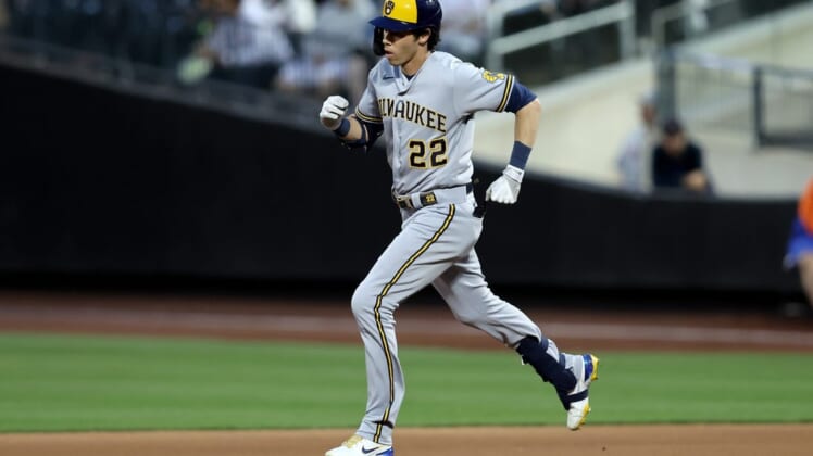Jun 16, 2022; New York City, New York, USA; Milwaukee Brewers left fielder Christian Yelich (22) rounds the bases after hitting a solo home run against the New York Mets during the fourth inning at Citi Field. Mandatory Credit: Brad Penner-USA TODAY Sports