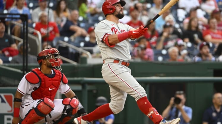 Jun 16, 2022; Washington, District of Columbia, USA; Philadelphia Phillies left fielder Kyle Schwarber (12) hits a two run home run against the Washington Nationals during the third inning at Nationals Park. Mandatory Credit: Brad Mills-USA TODAY Sports