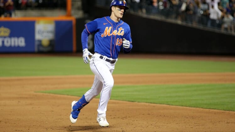 Jun 16, 2022; New York City, New York, USA; New York Mets left fielder Mark Canha (19) rounds the bases after hitting a two run home run against the Milwaukee Brewers during the fifth inning at Citi Field. Mandatory Credit: Brad Penner-USA TODAY Sports