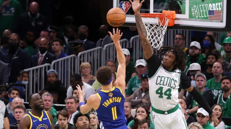 Jun 16, 2022; Boston, Massachusetts, USA; Boston Celtics center Robert Williams III (44) defends a shot from Golden State Warriors guard Klay Thompson (11) during the second quarter of game six in the 2022 NBA Finals at the TD Garden. Mandatory Credit: Paul Rutherford-USA TODAY Sports