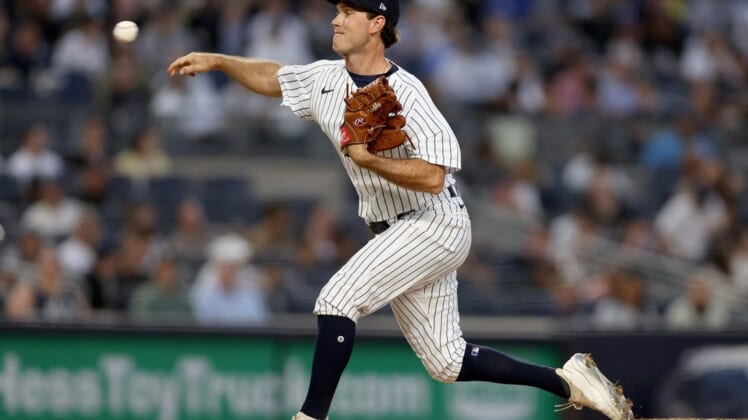 Jun 16, 2022; Bronx, New York, USA; New York Yankees relief pitcher Ryan Weber (85) delivers a pitch during the fourth inning against the Tampa Bay Rays at Yankee Stadium. Mandatory Credit: Vincent Carchietta-USA TODAY Sports