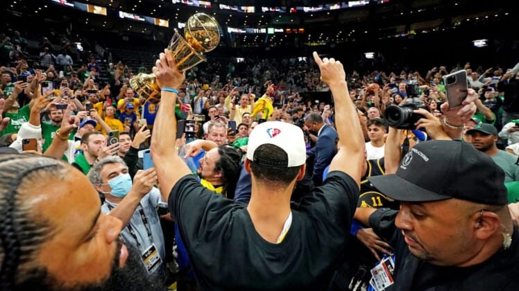 Jun 16, 2022; Boston, Massachusetts, USA; Golden State Warriors guard Stephen Curry (30) celebrates after the Golden State Warriors beat the Boston Celtics in game six of the 2022 NBA Finals to win the NBA Championship at TD Garden. Mandatory Credit: Kyle Terada-USA TODAY Sports