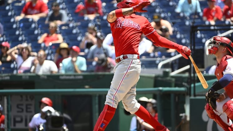 Jun 17, 2022; Washington, District of Columbia, USA; Philadelphia Phillies right fielder Nick Castellanos (8) hits a double against the Washington Nationals during the third inning at Nationals Park. Mandatory Credit: Brad Mills-USA TODAY Sports