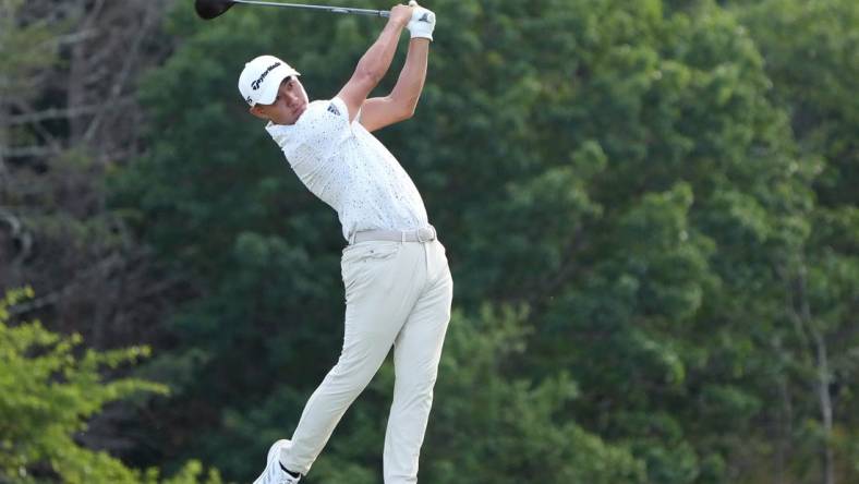 Jun 17, 2022; Brookline, Massachusetts, USA; Collin Morikawa plays his shot from the eighth tee during the second round of the U.S. Open golf tournament. Mandatory Credit: John David Mercer-USA TODAY Sports