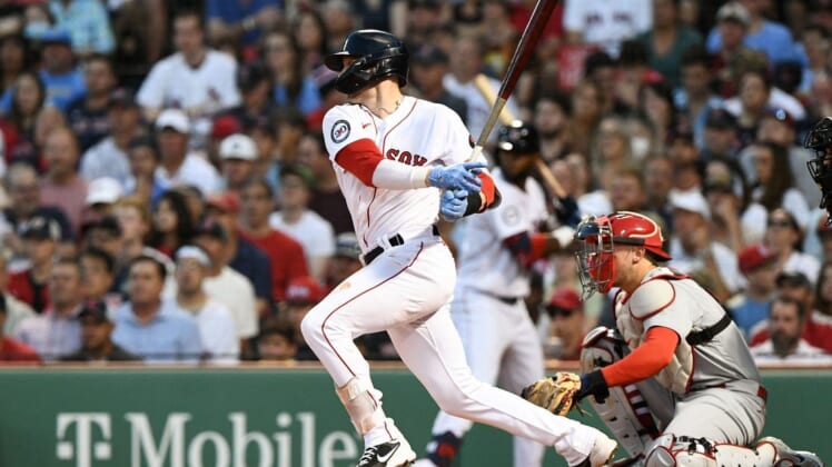 Jun 17, 2022; Boston, Massachusetts, USA; Boston Red Sox second baseman Trevor Story (10) hits a two-run RBI single against the St. Louis Cardinals during the fourth inning at Fenway Park. Mandatory Credit: Brian Fluharty-USA TODAY Sports