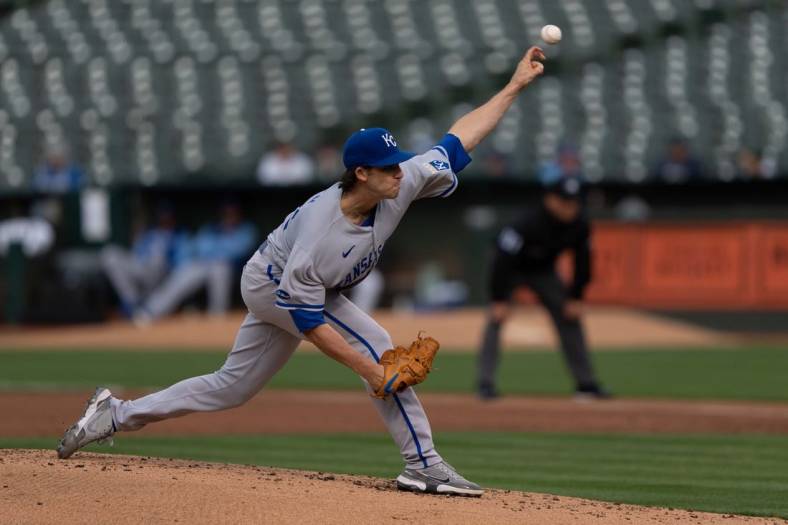 Jun 17, 2022; Oakland, California, USA; Kansas City Royals starting pitcher Daniel Lynch (52) pitches during the first inning against the Oakland Athletics at RingCentral Coliseum. Mandatory Credit: Stan Szeto-USA TODAY Sports