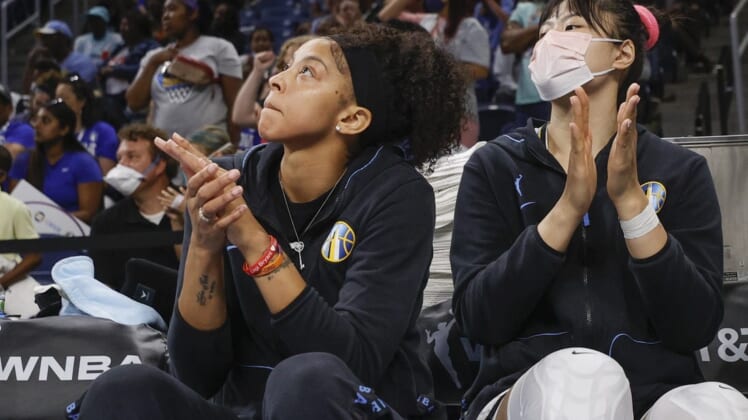 Jun 17, 2022; Chicago, Illinois, USA; Chicago Sky center Li Yueru (right) and forward Candace Parker (left) applaud their team during overtime of a WNBA game against the Atlanta Dream at Wintrust Arena. Mandatory Credit: Kamil Krzaczynski-USA TODAY Sports