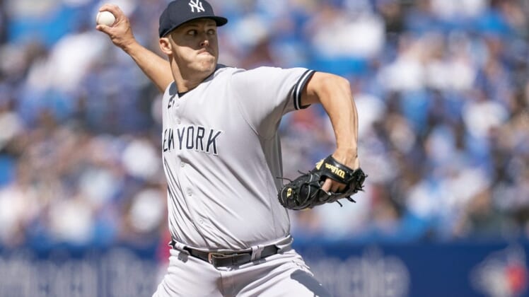 Jun 18, 2022; Toronto, Ontario, CAN; New York Yankees starting pitcher Jameson Taillon (50) throws a pitch against the Toronto Blue Jays during the first inning at Rogers Centre. Mandatory Credit: Nick Turchiaro-USA TODAY Sports