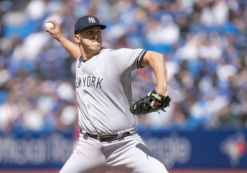 Jun 18, 2022; Toronto, Ontario, CAN; New York Yankees starting pitcher Jameson Taillon (50) throws a pitch against the Toronto Blue Jays during the first inning at Rogers Centre. Mandatory Credit: Nick Turchiaro-USA TODAY Sports