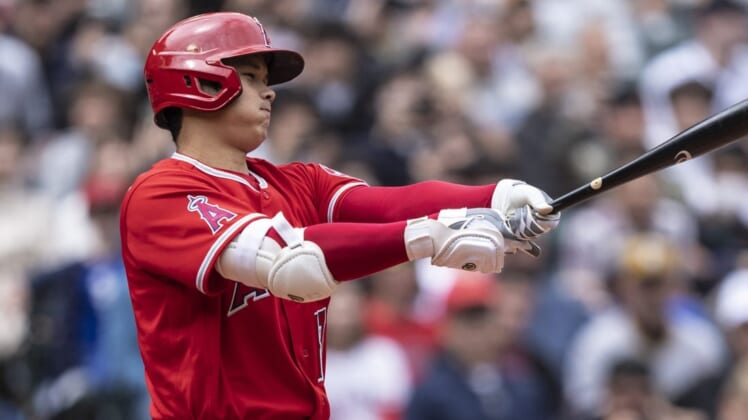 Jun 18, 2022; Seattle, Washington, USA; Los Angeles Angels designated hitter Shohei Ohtani (17) reacts after taking a swing during the fourth inning against the Seattle Mariners at T-Mobile Park. Mandatory Credit: Stephen Brashear-USA TODAY Sports
