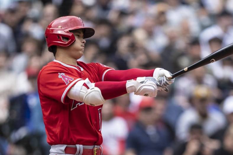 Jun 18, 2022; Seattle, Washington, USA; Los Angeles Angels designated hitter Shohei Ohtani (17) reacts after taking a swing during the fourth inning against the Seattle Mariners at T-Mobile Park. Mandatory Credit: Stephen Brashear-USA TODAY Sports