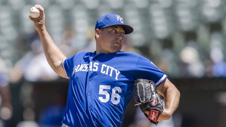 Jun 18, 2022; Oakland, California, USA;  Kansas City Royals starting pitcher Brad Keller (56) throws against the Oakland Athletics during the sixth inning at RingCentral Coliseum. Mandatory Credit: John Hefti-USA TODAY Sports