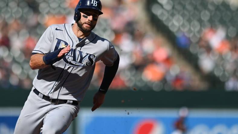 Jun 18, 2022; Baltimore, Maryland, USA; Tampa Bay Rays center fielder Kevin Kiermaier (39) rounds third base to score during the third inning against the Baltimore Orioles  at Oriole Park at Camden Yards. Mandatory Credit: Tommy Gilligan-USA TODAY Sports