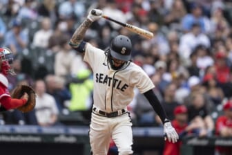 Jun 18, 2022; Seattle, Washington, USA; Seattle Mariners shortstop J.P. Crawford (3) reacts after flying out during the fifth inning against the Los Angeles Angels at T-Mobile Park. Mandatory Credit: Stephen Brashear-USA TODAY Sports