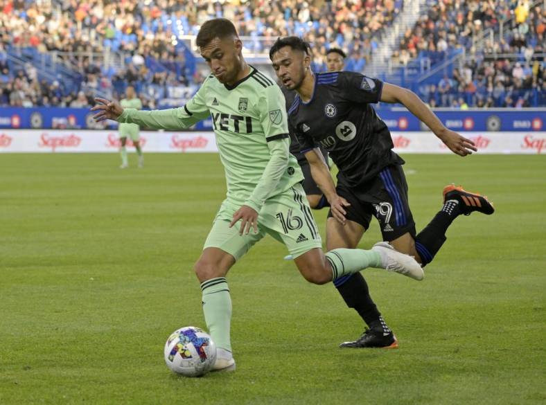 Jun 18, 2022; Montreal, Quebec, CAN; Austin FC midfielder Hector Jimenez (16) plays the ball as CF Montreal midfielder Mathieu Choiniere (29) defends during the first half at Stade Saputo. Mandatory Credit: Eric Bolte-USA TODAY Sports