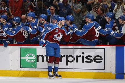 Jun 18, 2022; Denver, Colorado, USA; Colorado Avalanche left wing Andre Burakovsky (95) is congratulated following his goal against the Tampa Bay Lightning during the first period in game two of the 2022 Stanley Cup Final at Ball Arena. Mandatory Credit: Isaiah J. Downing-USA TODAY Sports