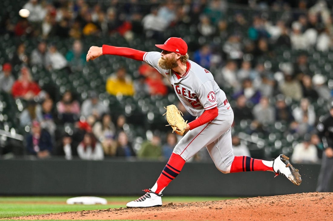 Jun 18, 2022; Seattle, Washington, USA; Los Angeles Angels relief pitcher Archie Bradley (23) throws against the Seattle Mariners during the ninth inning at T-Mobile Park. Los Angeles won 3-0. Mandatory Credit: Steven Bisig-USA TODAY Sports