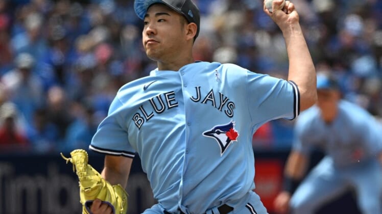 Jun 19, 2022; Toronto, Ontario, CAN; Toronto Blue Jays starting pitcher Yusei Kikuchi (16) delivers a pitch against the New York Yankees in the third inning at Rogers Centre. Mandatory Credit: Dan Hamilton-USA TODAY Sports