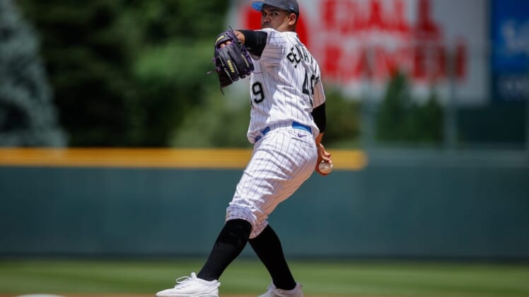 Jun 19, 2022; Denver, Colorado, USA; Colorado Rockies starting pitcher Antonio Senzatela (49) pitches in the first inning against the San Diego Padres at Coors Field. Mandatory Credit: Isaiah J. Downing-USA TODAY Sports