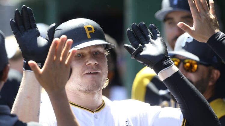 Jun 19, 2022; Pittsburgh, Pennsylvania, USA; Pittsburgh Pirates left fielder Jack Suwinski (65) celebrates his second solo home run of the game in the dugout against the San Francisco Giants during the sixth inning at PNC Park. Mandatory Credit: Charles LeClaire-USA TODAY Sports