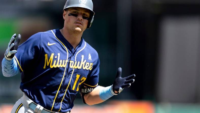 Milwaukee Brewers right fielder Hunter Renfroe (12) celebrates after hitting a 2-run home run in the seventh inning of the MLB game between the Cincinnati Reds and the Milwaukee Brewers in Cincinnati at Great American Ball Park on Sunday, June 19, 2022.

Milwaukee Brewers At Cincinnati Reds 41