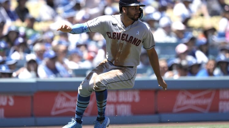 Jun 19, 2022; Los Angeles, California, USA; Cleveland Guardians left fielder Oscar Mercado (35) rounds third base to score in the second inning against the Los Angeles Dodgers at Dodger Stadium. Mandatory Credit: Kirby Lee-USA TODAY Sports